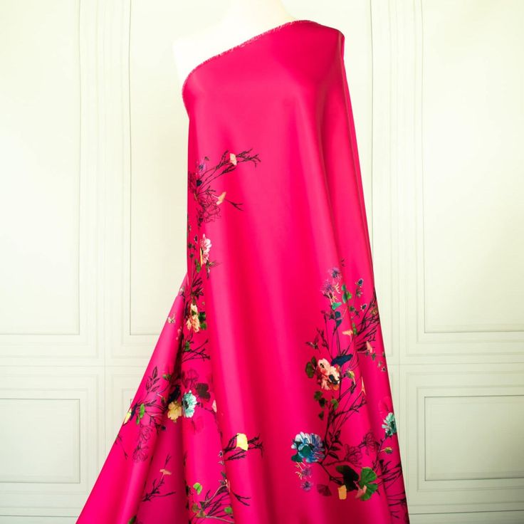 This gala-worthy couture dark pink duchesse satin fabric by the yard is perfect for standing out at weddings or any fancy event. With a gorgeous trailing floral vine, this dead stock fabric captures pure elegance. Originating from the Italian mills, and sourced from a designer who has dressed celebrities on the red carpet this densely woven matte satin has a smooth hand and fuller body, with a sponginess that would create a lovely column gown, corset top, or full skirt. Can't you just picture it with a crisp white shirt, so elegant. (Get yours while it lasts!) *We currently have a 3 yard, 2 yard and 1 yard cut. Contents: Poly BlendWidth: 54"Weight: MediumCare: Dry CleanUsage: Dress, Skirt, Suiting, Jacket All fabric and trim are sold by the yard. **Due to their special nature, we do not pr Fancy Event, Jersey Sweater, Nyc Design, Pure Elegance, Column Gown, Crisp White Shirt, Famous Designers, Floral Vine, Matte Satin