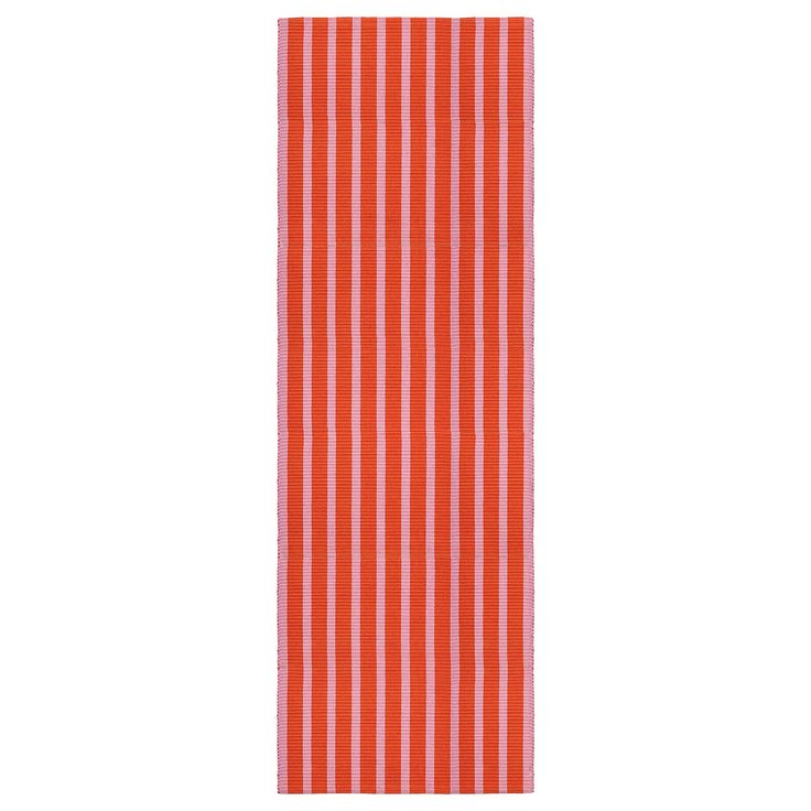 an orange and white striped towel on a white background, with vertical stripes in the middle