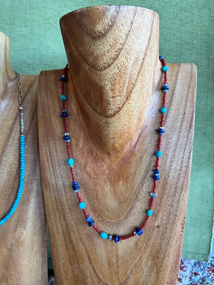 "This cheery necklace is similar to one sold in the Sundance Catalog several years ago. It is 18 inches long. Lapis Lazuli, Turquoise, Coral and antique African trade beads - each one 100-200 years old. All the silver in this necklace is .925 Sterling Silver including the little heart bead. Sterling silver lobster clasp. Necklaces like this one are call \"confetti\" necklaces, a wearable party!" Southwestern Single Strand Necklace For Festivals, Traditional Turquoise Jewelry With Tiny Beads, Sterling Silver Beaded Turquoise Necklace As Gift, Turquoise Single Strand Necklace For Festival, Southwestern Single Strand Jewelry Gift, Southwestern Single Strand Jewelry For Gifts, Vintage Tiny Beads Necklace For Gifts, Southwestern Adjustable Necklaces For Healing, Artisan Turquoise Jewelry With Tiny Beads