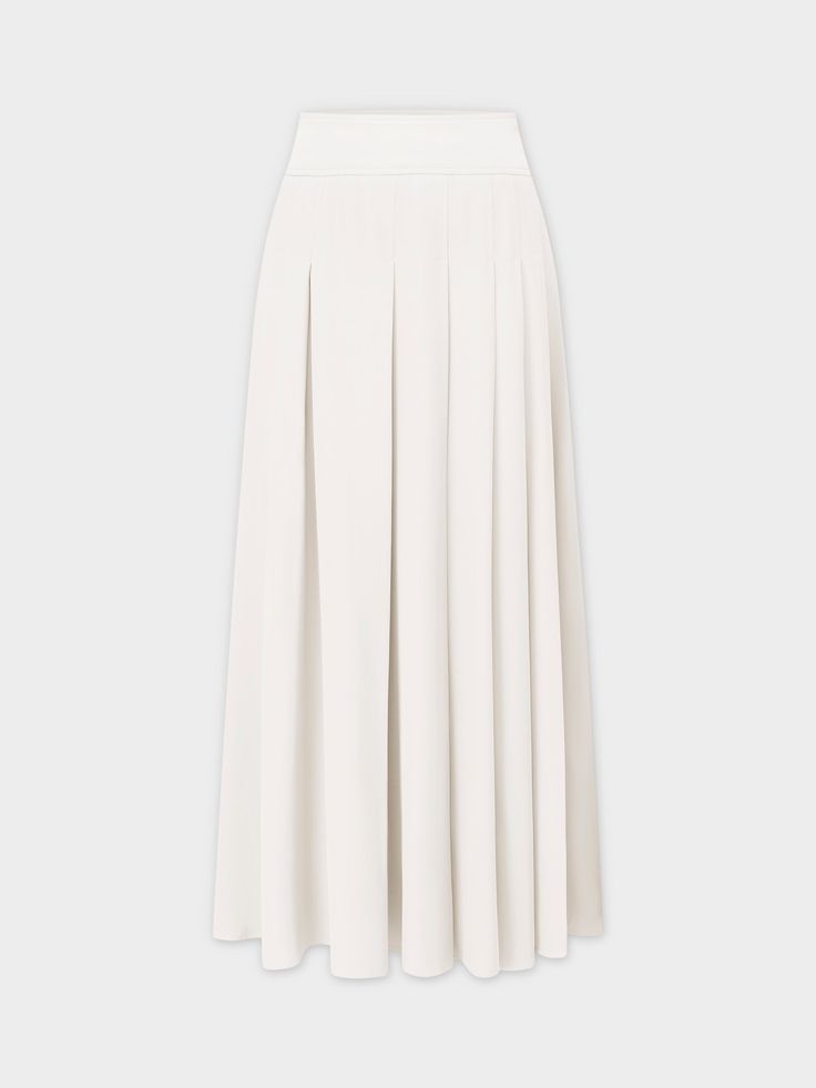 Experience effortless style with our Yolk Pleated Skirt in a classic white hue. The 37" length provides elegant coverage, while the pleated design adds texture to your look. Elegant A-line Maxi Skirt With Pleated Hem, Classic A-line Maxi Skirt For Formal Occasions, Elegant Summer Bottoms With Accordion Pleats, Elegant Summer Midi Pleated Skirt, Elegant A-line Pleated Skirt For Daywear, Classic Summer Pleated Skirt With Pleated Hem, Classic Summer Skirt With Pleated Hem, Classic Summer Bottoms With Accordion Pleats, Elegant Spring Maxi Skirt With Accordion Pleats