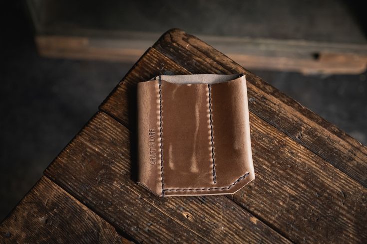 The EDC Slip 3-Up will stow and protect your favorite everyday carry items in style. Choose from our standard leather options, and keep an eye on our Limited Runs for unique leather drops. Also available in a 2-Up. ... 4.5 Wide x 5.25 Tall Pocket Widths: 1" Left, 2" Center, 1.5" Right. 4/5oz Full Grain Leather Hand saddle stitch Tanneries include Wickett & Craig, Tasman and Horween Also available in a 2-Up. Pairs with our EDC Bead. Functional Leather Trifold Wallet For Daily Use, Functional Leather Trifold Wallet, Functional Leather Trifold Wallet For Travel, Leather Trifold Wallet With Waxed Finish, Leather Trifold Wallet With Waxed Finish For Everyday Use, Leather Trifold Wallet With Pockets, Leather Trifold Wallet With Hidden Phone Sleeve For Travel, Brown Leather Wallet With Hidden Phone Sleeve, Functional Leather Wallets For Everyday Carry