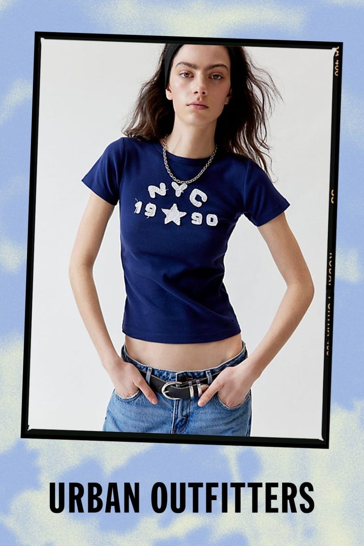 '90s baby tee vibes with this soft and stretchy cropped top complete with NYC applique at the chest. Only at Urban Outfitters. Features NYC 1990 applique baby tee Soft and stretchy baby tee Raw-edge NYC applique at the chest Bodycon fit Cropped length UO exclusive Content + Care 100% Cotton Machine wash Imported Size + Fit Model in Grey is 5’10.5" and wearing size Medium Measurements taken from size Medium Chest: 28" Length: 21" | NYC 1990 Applique Baby Tee in Navy, Women's at Urban Outfitters Fitted Graphic Tee From Urban Outfitters, Urban Outfitters Relaxed Fit Screen Print Top, Urban Outfitters Baby Tee, Urban Outfitters Blue Cotton Crop Top, Urban Outfitters Cotton Screen Print T-shirt, Stretchy Crop Tops, 90s Baby, Nyc Shopping, Media Chest