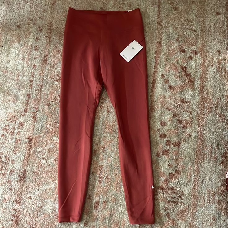 Nike One Mid Rise Full Length Therma Fit Soft Rust Colored Leggings Size Small. Insanely Soft And Comfortable! New With Tags! Stretch Nike Yoga Pants, Nike Solid Bottoms For Pilates, Nike Bottoms For Pilates, Nike Full Length Leggings For Yoga, Nike Compression Bottoms For Pilates, Nike Full Length Yoga Leggings, Nike Compressive Bottoms For Yoga, Stretch Red Pants For Pilates, Red Compressive Full-length Bottoms