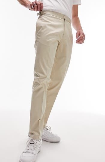 Modern polish defines these slim-fitting chinos cut from a seasonless blend in a versatile solid hue. 29" inseam, 12" leg opening, 11" front rise, 15" back rise (size 32) 67% polyester, 31% viscose, 2% elastane Machine wash, line dry Imported Slim Fit Chinos For Spring, Slim Fit Spring Chinos Trousers, Slim Fit Solid Color Dress Pants For Spring, Slim Fit Solid Dress Pants For Spring, Solid Color Slim Fit Straight Leg Dress Pants, Formal Straight Leg Chinos For Spring, Formal Spring Straight Leg Chinos, Fitted Cotton Bottoms With Straight Hem, Slim Fit Tapered Leg Work Pants For Spring