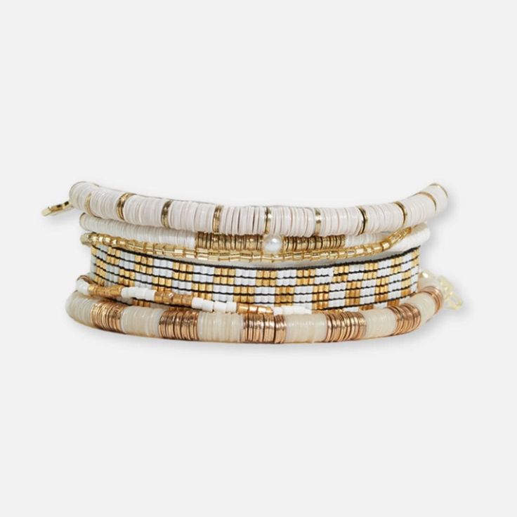 Mixed Bracelet Stack of 6 Ivory and Gold Trendy Adjustable Multi-strand Jewelry, Stacked Adjustable Beaded Bracelets, Adjustable Stacked Bangle Bracelets, Trendy Stackable Bangle Stretch Bracelet, Trendy Stackable Stretch Bangle Bracelet, Chic Bangle Bracelets As Fashion Accessory, Chic Bangle Bracelets, Trendy Bangle Bracelets For Parties, Chic Beaded Bracelet For Gift