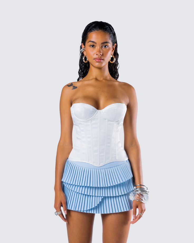 Leave them speechless when you walk in wearing this white corset top 🤍 This sultry strapless look is crafted from satin, and complete with boning and a fully-lined finish that creates an elegant, yet sexy look 😏 Flirty Fitted Corset With Spaghetti Straps, Fitted Flirty Corset With Spaghetti Straps, White Overbust Corset For Spring, Fitted Strapless Tube Top With Lined Bodice, Fitted Bandeau Tube Top With Lined Bodice, White Boned Bodice Corset For Spring, Chic Strapless Corset, Chic White Overbust Corset Dress, Fitted Strapless Tube Top With Boned Bodice