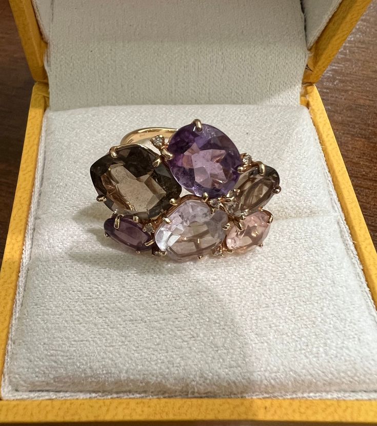 A fabulous one-of-a-kind 18K rose gold Vianna Brasil statement ring.  This ring will WOW! The particulars:  beautifully shaped and faceted stones including Pink Qmethyst, Amethyst, Rose Quartz and Smokey Quartz.  Total stone weight is 11.5 tcw,  Accent diamonds weigh 0.012 tcw. The ring weight 6.18 grams and is very comfortable on the finger-not heavy feeling.  The ring will fit someone that wears a size 6.75-7 ring. Vianna Brasil is one of Brazil's most highly regarded jewelry designers.  Their Elegant Rose Gold Multi-stone Amethyst Ring, Luxury Amethyst Ring With Rose Cut Diamonds For Gift, Luxury Rose Gold Amethyst Ring As Gift, Smokey Quartz Ring, Santa Clarita, Jewelry Designers, Pink Amethyst, Quartz Ring, Smokey Quartz