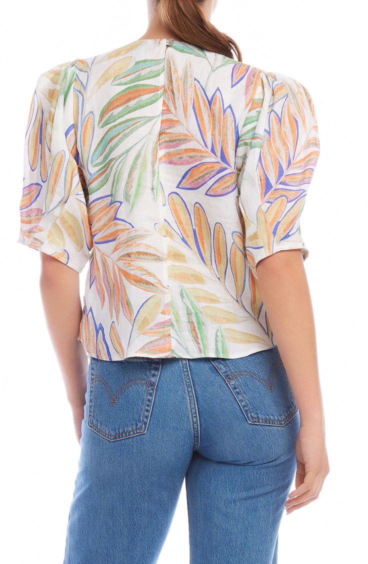 Get in vacation mode with this pretty puff-sleeve top cut from lightweight, breathable linen with a vibrant tropical print. 22 1/2" length (size Small) Back keyhole with button-and-loop closure Crewneck Elbow-length sleeves 100% linen Dry clean Made in the USA of imported fabric Spring Leaf Print Short Sleeve Tops, Multicolor Linen Tops For Spring, Short Sleeve Leaf Print Spring Top, Summer Linen Top With Floral Print, Summer Linen Tops With Floral Print, Summer Floral Print Linen Tops, Summer Vacation Puff Sleeve Short Sleeve Top, Summer Vacation Puff Sleeve Top, Summer Vacation Puff Sleeve Top With Short Sleeves