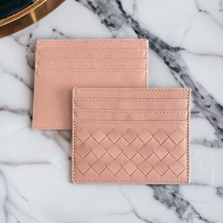 Handmade. Color: Pink Height: 8 cm | 3.1'' Width: 10,5 cm | 4.1" Depth: 0,5 cm | 0.2'' Weight: 0.06 kg - 0.07 kg Premium quality is our first priority. Every process of our hand-woven card holders is made by master by hand.  One side weaved intrecciato leather with 3 slots, other side plain with 3 slots and a central pocket for notes, receipts or additional cards. Each card slot is equipped with lining, keeping your personal and financial info safe. High Quality Durable Leather Sleek and Long-Lasting Look Rigorous Quality Control Unique, slim, minimalist, compact, stylish and luxury handmade card holder. Unisex style. Great gift for a girlfriend or boyfriend, husband or wife, moder or father, daughter or son, brother or sister, groomsmen or best friend in your life. This gorgeous card hold Elegant Pink Everyday Card Holder, Elegant Pink Card Holder, Modern Pink Card Holder, Beige Bifold Card Holder As Gift, Modern Handmade Wallets For Gifts, Modern Handmade Wallets As Gifts, Beige Card Holder With Interior Slots As Gift, Classic Pink Wallet As A Gift, Classic Handmade Card Holder For Daily Use