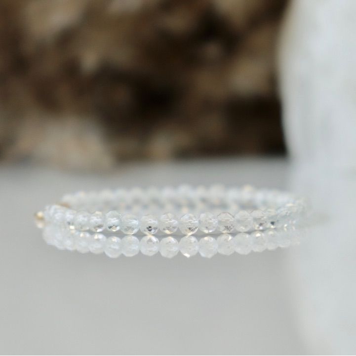 Brand New, Unused Gorgeous Dainty Genuine White (Clear) Topaz Beaded Gemstone Bracelet. Beads Are 1/8” In Diameter And Strung On Strong 6.75” Clear Cord, And Finished With Solid Sterling Silver .925 Clasp. This Bracelet Is Brand New And Has Never Been Worn! So Pretty Worn Alone, Sparkly And Delicate, Or Stacked With Other Bracelets. Each Bead Is Covered In Tiny Facets And Catches Light Beautifully. Bead Height 1/8” Total Bracelet Length 6.75” Weight 2g White Topaz Symbolizes Hope, Love, And Happ White Moonstone Crystal Bracelet With Gemstone, White Moonstone Gemstone Crystal Bracelet, Elegant Adjustable Gemstone Beads Crystals, White Crystal Bracelet With Faceted Beads, Elegant Quartz Jewelry With Gemstone Beads, White Moonstone Crystal Bracelet, Hand-strung, Elegant Quartz Round Beads Jewelry, White Faceted Beads Crystal Bracelet, White Moonstone Hand-strung Crystal Bracelet