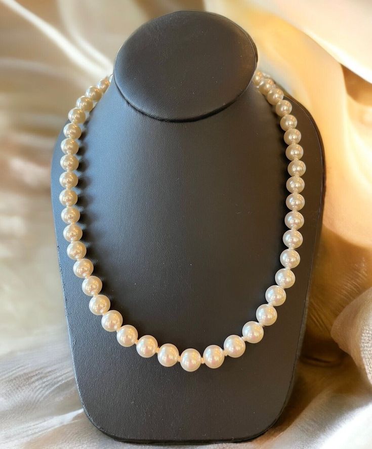 Vintage faux pearl hand knotted necklace circa 1950's . The box clasp has a butterfly  with rhinstone wings and a faux pearl.  The necklace had one owner my grandmother who lovingly cared for all her jewelry by keeping them wrapped and boxed.  Mint condition and comes in a gift box. Shop more vintage necklaces go to https://www.Etsy.com/shop/Historicallyhers Classic Pearl Necklace For Evening, Classic Evening Pearl Necklace With Round Beads, Formal Single Strand Pearl Beaded Necklace, Vintage Pearl Embellished Necklace As Gift, Vintage Pearl Necklace As Gift, Vintage Pearl Embellished Necklace For Gift, Classic Pearl Beaded Necklace For Formal Occasions, Formal Pearl White Costume Jewelry Necklace, Formal Costume Pearl Necklace