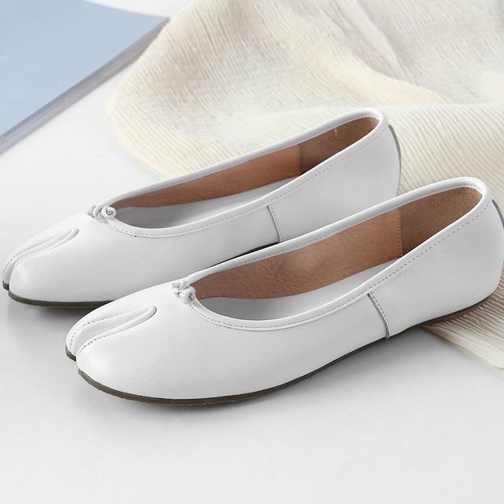 Depicted on the front of these leather ballerina shoes, this slip-on pair is both unique and versatile. Style: Ballet Flats Upper Material: Calf Leather Shoe Width: Standard Type: Flat Department: Women Toe Shape: Splite toe Occasion: Casual Slip-on Ballet Flats With Stitched Sole, Leather Slip-on Ballet Flats For Spring, Spring Leather Sole Slip-on Flats, Spring Leather Shoes With Flat Sole, White Casual Ballet Flats For Spring, Casual White Ballet Flats For Spring, Summer Slip-on Ballet Flats With Rubber Sole, Spring Ballet Flats With Round Toe, Stitched Sole Closed Toe Ballet Flats