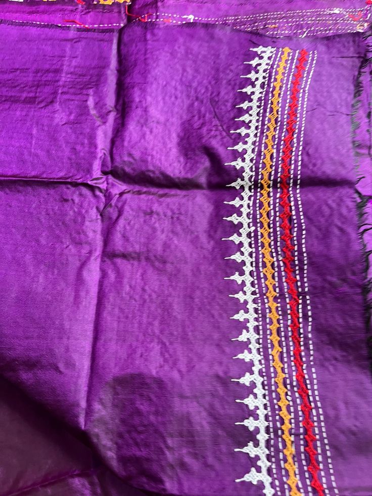 Hand Embroidered Gujrati Stitch Saree with Blouse piece | Pure Banglore Silk Saree | Kutchi Hand Work | Wedding Wear pure Silk Saree Wedding wear saree, party wear saree, pure silk saree, hand embroidered saree, hand work saree. This is authentic hand embroidered Gujrati Stitch Saree. The unique thread embroidery design is entirely handcrafted by our skilled artisans. The most significant aspect of hand embroidery is the running stitch pattern. The running blouse piece is included with this premium quality pure silk saree. Saree Length : 5.5 mtr Blouse Piece Length : 1 mtr Weight : 700 gm approx Design : Hand Gujrati stitch Work The fabric is best quality Pure Banglore Silk. Each Saree takes 8-10 months to complete.  Wash care - Dry clean only. SLIGHT DIFFERENCE IN SHADE MIGHT APPEAR DUE T Purple Handloom Semi-stitched Traditional Wear, Embroidered Purple Tussar Silk Traditional Wear, Silk Traditional Wear With Embroidered Border For Puja, Purple Embroidered Chanderi Saree, Transitional Purple Saree With Resham Embroidery, Unstitched Purple Embroidered Fabric With Embroidered Border, Unstitched Purple Fabric With Embroidered Border, Purple Unstitched Embroidered Fabric With Border, Purple Resham Embroidery Dupatta For Transitional Season