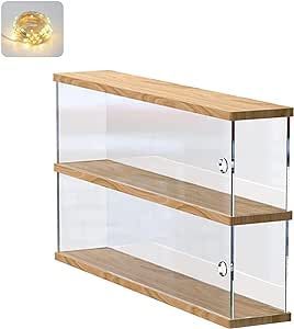 two glass shelves with lights on each side and one shelf below the other, in front of a white background