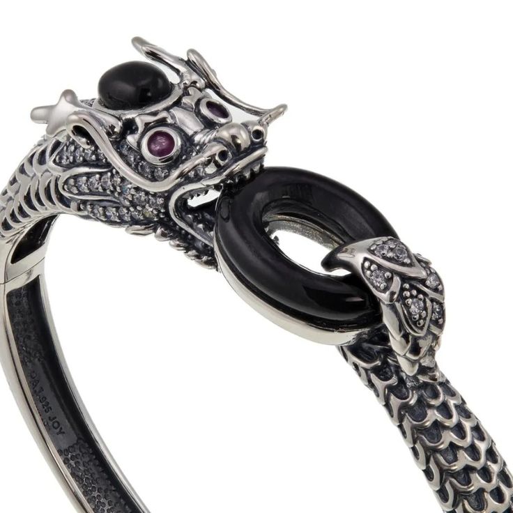 Jade Of Yesteryear Black Jade, Ruby And Cz Dragon Bracelet Hsn Price: $389.99 From The Ruby-Red Eyes To The Glistening Czs And Black Jade Accents, This Lovely Dragon Bracelet Is An Eyecatcher. It's A Winner Day Or Night. Slip It On And See. Measures 7-1/2" Inch Fit Design Information Sterling Silver Dragon With Clear Round Cz Accents And 2 Round Ruby "Eyes" Black Jade Oval Gemstone Accent On Head Black Jade Open Oval Spacer Metal: 925 Sterling Silver Stones: -Genuine Black Jade -Genuine Ruby -Cu Silver Jewelry With Black Enamel For Party, Party Jewelry In Silver With Black Enamel, Black Oxidized Sterling Silver Bracelet, Black Sterling Silver Bracelet With Oxidized Finish, Elegant Black Bracelet With Oxidized Finish, Black Oxidized Finish Bracelet Jewelry, Elegant Silver Bracelet With Black Enamel, Black Engraved Sterling Silver Bracelet, Engraved Black Sterling Silver Bracelet