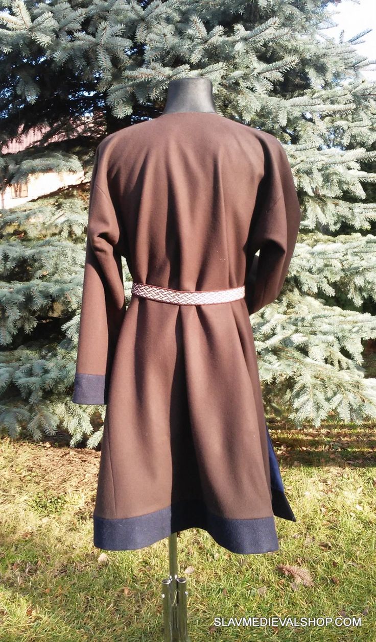 Scandinavian MEN'S COAT It's made on the basis of finds from Haithabu - Viking trade city. http://www.alternaliv.se/histvarld/draekter/vherreman/kaftan.html It's a longer version with two wedges on the both sides. Slightly tapered sleeves are sewn, with square wedges, so they do not constrict movement. The coat has a lining made of natural 100% linen in selected colour. This is an additional layer of insulation, so the coat is perfect for cooler days or winter expeditions. An outfit is sewn with Historical Design Long Sleeve Outerwear For Fall, Historical Long Sleeve Outerwear For Fall, Medieval Style Long Sleeve Outerwear For Fall, Medieval Outerwear For Winter Cosplay, Medieval Style Outerwear With Buttons For Fall, Medieval Style Fall Outerwear With Buttons, Medieval Fall Outerwear With Buttons, Medieval Long Coat For Winter, Medieval Style Long Winter Coat