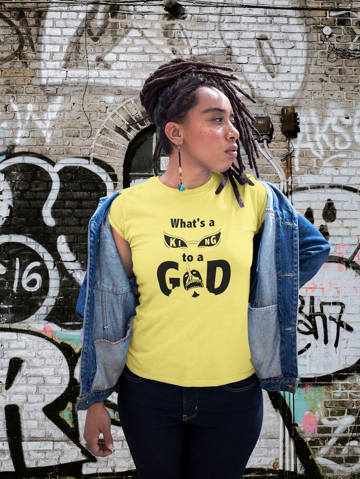 "Fans of Kanye and One piece would love this hip-hop-inspired design.  Featuring an anime take on the phrase from the Rap song \"No Church in the Wild\". King of Dressrosa but in the face of God Usopp where does a king stand? Available in white or black with sizes XS-3XL  Men's Version: https://www.etsy.com/listing/1268384803/one-piece-kanye-and-jay-z-no-church-in Images are currently printed using vinyl on 100% airlume combed and ring-spun cotton. All purchases are made to order and using vinyl Pop Culture Screen Print Tops For Cosplay, Band Merch Cotton Tops For Cosplay, Hip Hop Cotton Tops With Character Print, Pop Culture Text Print Tops For Streetwear, Pop Culture Streetwear Tops With Graphic Design, Casual Graphic T-shirt For Cosplay, Pop Culture Graphic Design Tops For Streetwear, Casual Graphic Design T-shirt For Cosplay, Graphic Print Cotton Tops For Cosplay