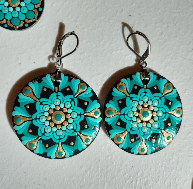 - Teal and Gold On Lightweight Wood - Stainless Steel Lever Back Hardware - Hand Painted  - Varnished for Durability - Free Shipping In US On Orders over $35 Green Dangle Earrings With Artistic Design, Green Artistic Dangle Earrings, Green Earrings With Artistic Design For Gift, Artistic Turquoise Earrings With Ear Wire, Artistic Turquoise Earrings For Gift, Artistic Blue Round Earrings, Artsy Turquoise Nickel-free Earrings, Artsy Nickel-free Turquoise Earrings, Turquoise Clip-on Earrings As Gift