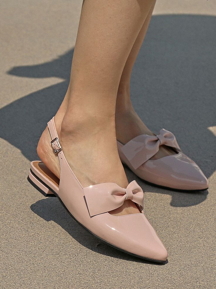 Editor's NotesThese shoes from LOWFLOW are trendy and easy to style.- Tinia Ribbon Flat SlingBack- Pointed toe- Simple design- Modern and chic mood- Wear yours with a maxi skirt or wide pants to complete a modern & chic outfitMeasurements(in.)- Size: KR 220mm - KR 255mm - Heel height 0.39 in.- Fits true to the sizeComposition & Care- COW LEATHER / SHEEP LEATHER- Professional shoe cleaning recommendedDesigner- by LOWFLOW Elegant Flats With Heel Strap For Spring, Spring Patent Leather Flat Slingback Pumps, Summer Patent Leather Flats, Summer Patent Leather Flats With Low Heel, Elegant Patent Leather Flats For Summer, Chic Pink Flats With Low Heel, Feminine Slingback Sandals For Spring, Summer Feminine Pointed Toe Flats With Low Heel, Pink Feminine Slingback Sandals