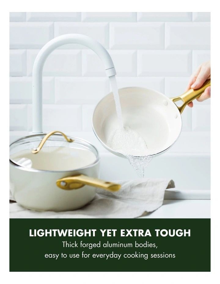 a person pouring flour into a white bowl on top of a counter next to a gold handle