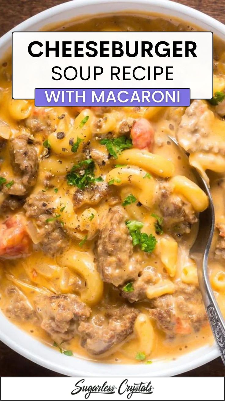 a bowl of cheeseburger soup with macaroni in it and a spoon