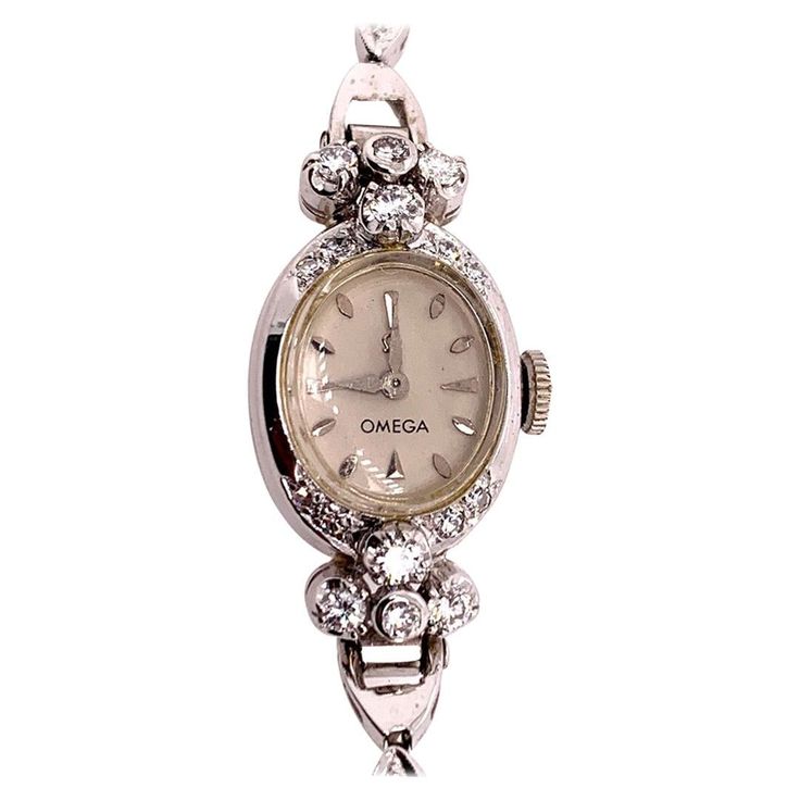 Rare Ladies Collectable OMEGA 14k White Gold with approximately 1.25 carat of Natural Diamond Manual Wind Cocktail Watch. It is set with 34 natural colorless diamonds weighing approximately 1.25 carats, the watch itself weighs 14.34 grams and is approximately 5.75" inches in length. Condition is Pre-owned. No original box, No original papers. Jewelry Goals, Omega Ladies, Cocktail Watch, Cocktail Vintage, Art Deco Watch, Vintage Clocks, Antique Costume Jewelry, Vintage Watches Women, Watch Jewelry