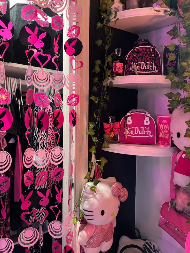 a hello kitty themed closet with pink decorations