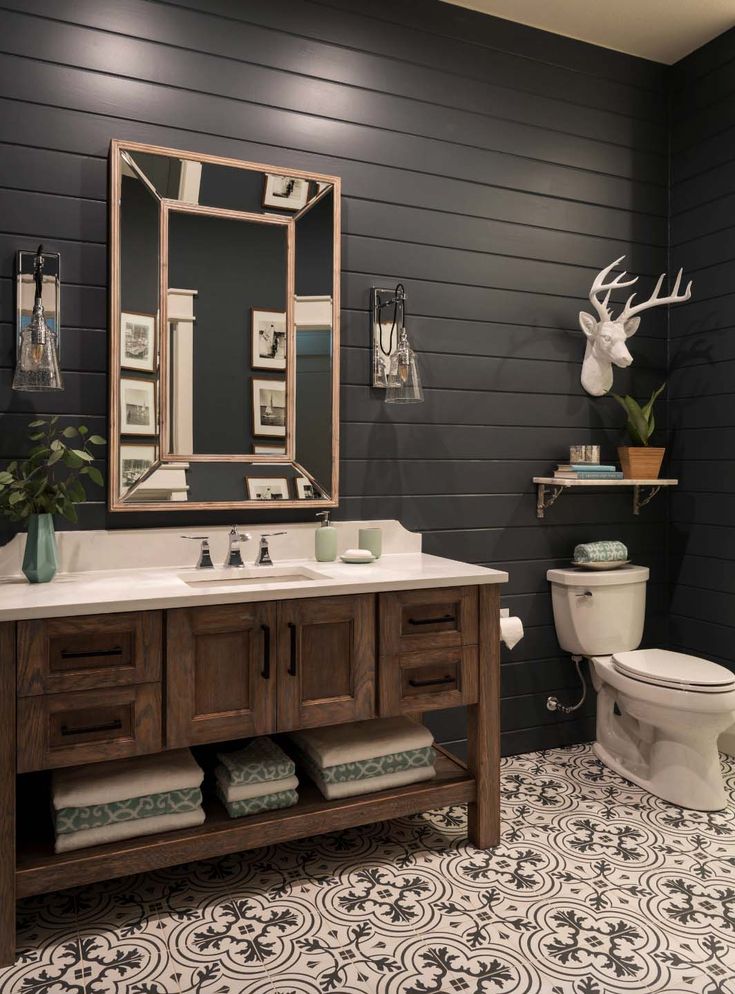 the bathroom is decorated in gray and white