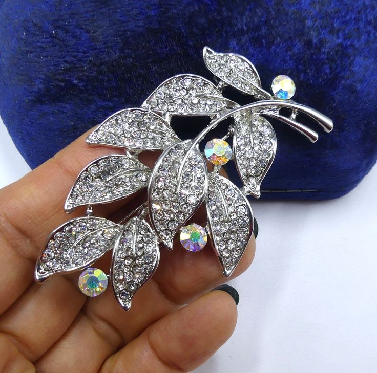 Vintage silver tone clear rhinestone pin brooch, In good vintage condition, It's 2"7/8 x 1" 5/8. Thanks. Silver Brooch Pins For Costume Jewelry, Silver Costume Jewelry Pins Brooch, Silver Costume Jewelry Brooch Pins, Silver Rhinestone Brooches For Formal Occasions, Silver Rhinestone Brooches For Anniversary, Silver Crystal Brooches For Gift, Silver Crystal Brooches As Gift, Formal Silver Brooches With Rhinestones, Formal Silver Rhinestone Brooches