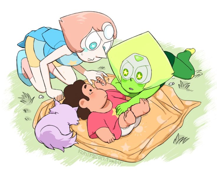 two children are playing with an alien on a blanket while another child looks at it