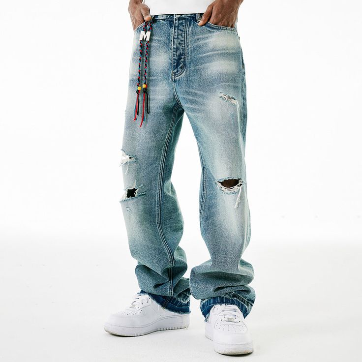 Unlock edgy and effortless style with our M ripped jeans. Made with high-quality denim, these jeans are designed to be both durable and fashionable. The distressed detailing adds a touch of edginess to your look, making them perfect for any occasion. Elevate your wardrobe with these premium jeans that exude sophistication and exclusivity. Features: -45% Cotton, 55% Polyester -Mid-Waist -Premium Denim Fabric -Regular fit -Street style Free Socks, Fashion App, Premium Denim, Denim Fabric, Ripped Jeans, Effortless Style, Street Style, Streetwear Brands, Wardrobe