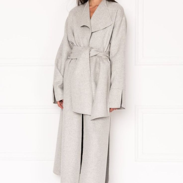 Condition: New With Tags! Never Used Or Worn. Size: Xs - Color: Light Gray - Removable Scarf - Inseam Pockets - Side Slits - Double-Faced Wool - 50% Wool, 50% Polyester - Centerback Length From Neckline To Bottom Hem For Size Xs Is 52 1/2" - The Cordelia Maxi Coat Is A True Stand-Out. Whether Worn Open To Compliment Your Look, Or Buttoned-Up And Completed With The Removable Scarf, This Versatile Stunner Commands Attention Without Even Trying. Tie The Scarf As A Belt For A Fashion-Forward Look. Oversized Luxury Spring Outerwear, Luxury Oversized Outerwear For Spring, Luxury Fall Daywear Outerwear, Oversized Wool Coat, Black Faux Fur Coat, Maxi Coat, Black Faux Fur, Faux Fur Coat, Grey Fashion