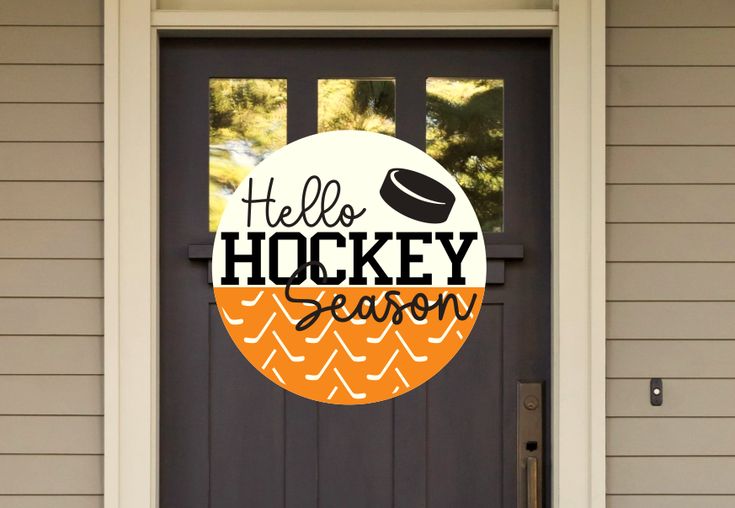 a door with the words hello hockey season on it and an image of a hat