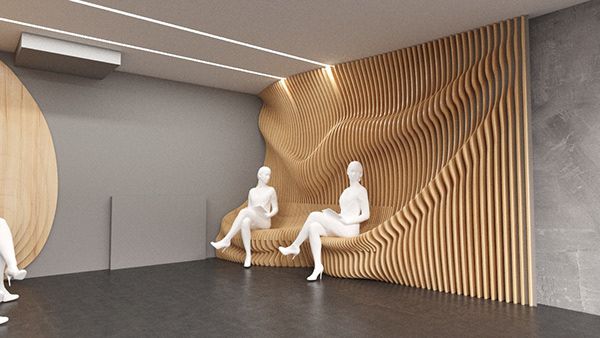 three white mannequins are sitting in front of a wooden paneled wall