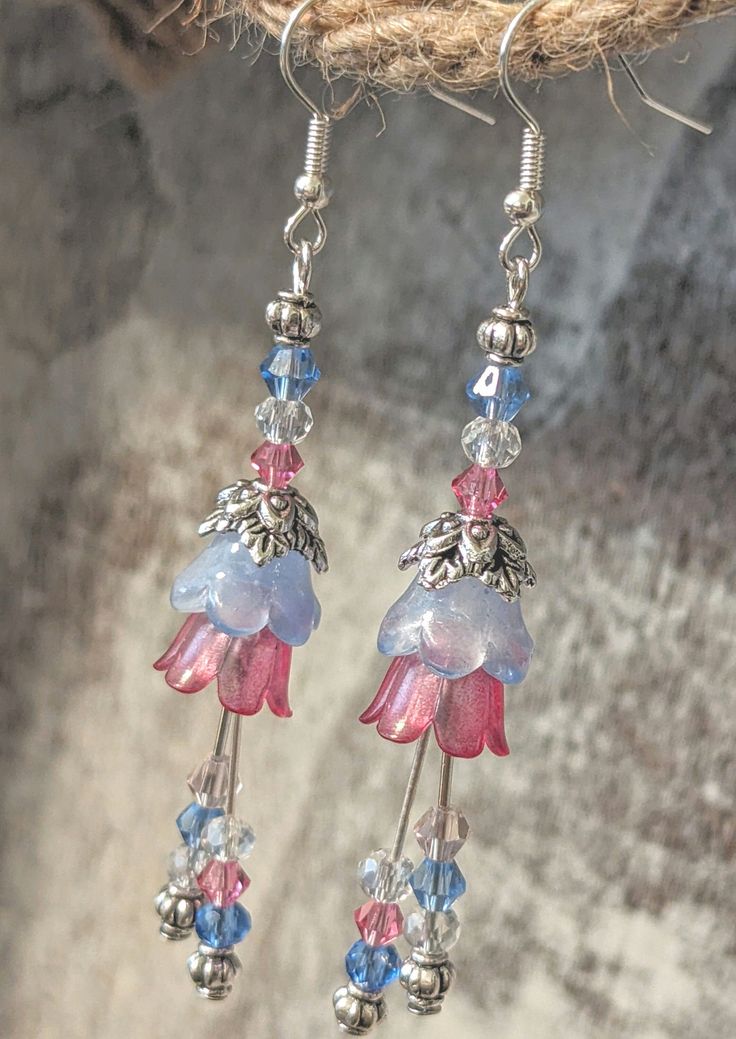 Delicate and fun flowers with dangling crystals!! Made with Preciosa crystal beads, silver plated beads, blue Czech glass flowers and pink acrylic lily of the valley!! Perfect for a fairycore costume or for bridesmaids!! Length 3" Fairytale Cosplay, Fairycore Jewelry, Creative Earrings, Lucite Flower Earrings, Dance Earrings, Fairies Dancing, Pink Fairy, Diy Jewelry Unique, Silver Flower Earrings