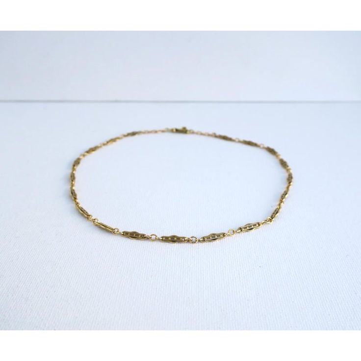 This is part of Chairish’s Fine Jewelry assortment.  A beautiful, elegant, detailed, strong, and well-made choker necklace in 14-karat yellow gold, circa mid to late-20th century. Necklace has beautiful, detailed chain links and detailed bar clasp. A chic vintage piece to wear alone or stack with other necklaces, dress up or down. Very good condition as shown in images. No issues. Marked '14k' on clasp. A true choker necklace measuring: 13.88" long.  Emerald stud earrings (in ear) are also avail Victorian Yellow Gold Necklace With Curb Chain, Victorian Yellow Gold Curb Chain Necklace, Dainty Oval Link Necklaces For Formal Occasions, Dainty Oval Link Necklace For Formal Occasions, Victorian Style Necklace With Curb Chain Link, Vintage Yellow Gold Curb Chain Necklace, Victorian Link Necklaces With Curb Chain, Classic 14k Gold Chain Necklace For Wedding, Heirloom Yellow Gold Necklaces With Curb Chain