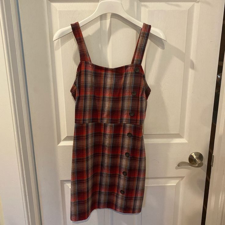 Never Worn. Perfect For Fall! Plaid Sleeveless Mini Dress For Day Out, Plaid Sleeveless Mini Dress For Date Night, Casual Plaid Mini Dress For Day Out, Casual Plaid Sleeveless Midi Dress, Sleeveless Plaid Mini Dress For Date Night, Casual Sleeveless Plaid Midi Dress, Plaid Sleeveless Dress For Date Night, Casual Black Sleeveless Plaid Dress, Sleeveless Plaid Dress For Date Night