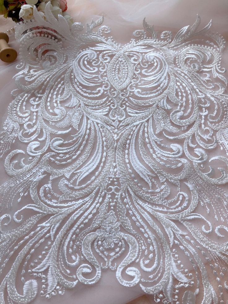 "Ivory Lace applique, beaded lace applique, french chantilly lace applique, wedding lace applique, sequins lace Listing is for one piece. Measure approx: 17.6\" x 12.2\" (44.7 cm x 31 cm) Use for neckline, bridal headpiece, wedding accessories, gifts, bags decoration, etc, you can enjoy the process of DIY, enjoy your beautiful life * Wholesale acceptable! My shop link: http://www.etsy.com/shop/lacelindsay If you have any questions please message me. Thank you for looking." Wedding Embellished Lace Embroidered Fabric, Wedding Embellished Lace Fabric, White Embellished Lace For Wedding, French Chantilly Lace, Fabric Decoration, Corded Lace Fabric, Pearl Embroidery, Corded Lace, Linens And Lace