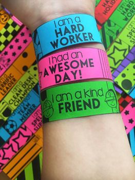 colorful wristbands that say i am kind of hard worker and have an awesome day