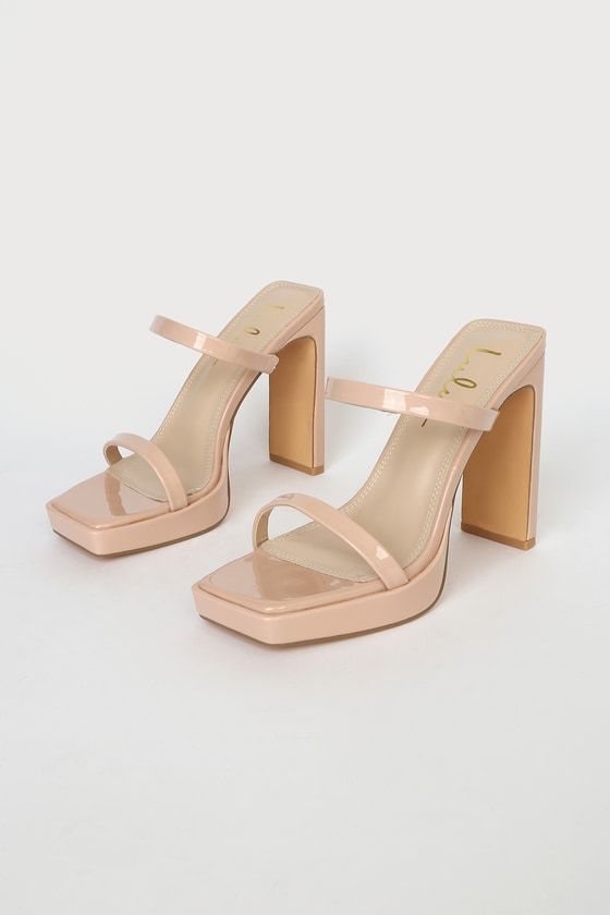 Who wouldn't be completely obsessed with the Lulus Fausee Light Nude Patent Square Toe Platform Slide Sandals! Sleek patent faux leather shapes these heels with a trendy square footbed (with a 0.5"" toe platform), a slender toe strap, and a matching vamp strap with a bit of elastic at the side. An easy-to-slide-on design tops a sky-high blade heel for a chic look! 4. 5" wrapped heel. Cushioned insole. Rubber sole has nonskid markings. All Man Made Materials. Imported. Lulus | Fausee Light Nude P Trendy Patent Leather Block Heels, Trendy Patent Leather Block Heels For Spring, Summer Patent Leather Block Heels With Sculpted Heel, Spring Heels With Square Toe In Polyurethane, Spring Heels With Square Toe Made Of Polyurethane, Spring Square Toe Heels In Polyurethane, Summer Patent Leather Heels With Square Toe, Summer Square Toe Patent Leather Heels, Beige Modern Synthetic Heels