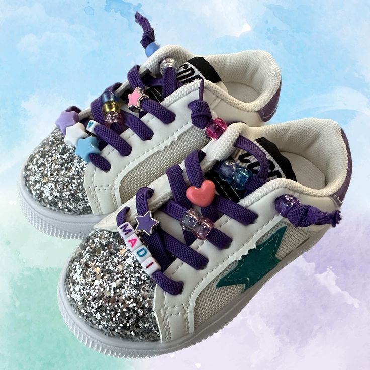 The cutest customized sneakers! ⭐️ WHAT'S INCLUDED IN THIS LISTING ⭐️ *Name/nickname/title using  BLACK  or WHITE block bead letters (no additional cost for lengthy names!) *Matching assorted beads, including charms seen in listing photos.   *I will curate the beads to best match the sneaker you pick.  If you have any specific color theme or bead preference, just let me know. ⭐️ SIZING ⭐️ EU    US 21     5.5 22     6-6.5 23     7 24     7.5-8 25     8.5-9 26     9.5 27     10-10.5 28     11 29 Customizable Lace-up Sneakers For Gift, Adjustable Sneakers With Elastic Laces And Round Toe, Customizable Lace-up Sneakers For Gifts, Casual High-top Sneakers For Birthday, Casual Lace-up Sneakers For Birthday, White Personalized Sneakers As Gift, White Personalized Sneakers For Gift, Personalized White Sneakers As Gift, Personalized White Sneakers For Gifts