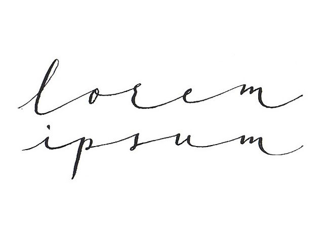 the word love is written in cursive writing