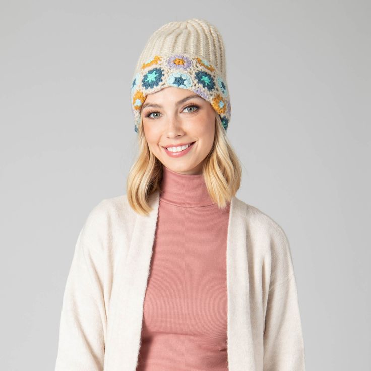 For cold weather with style, you can't beat this cozy Curb Crochet Beanie! With its adorable pastel floral accent, you'll look bright and cheery even when the weather isn't! Make winter a breeze with this hand-knit and cuffed beanie! Features: Color: PastelMaterials: 100% AcrylicSize: 57cmCold Weather Winter Cream Crochet Hat With Soft Knit, Cream Crochet Winter Hat With Soft Knit, Cream Soft Knit Crochet Hat For Winter, Cream Crochet Hat For Winter, One Size, Cream Crochet Hat For Winter, Cream Winter Crochet Hat One Size, Adjustable Cream Beanie, Casual Cream Crochet Hat For Winter, Cozy White Crochet Hat For Fall