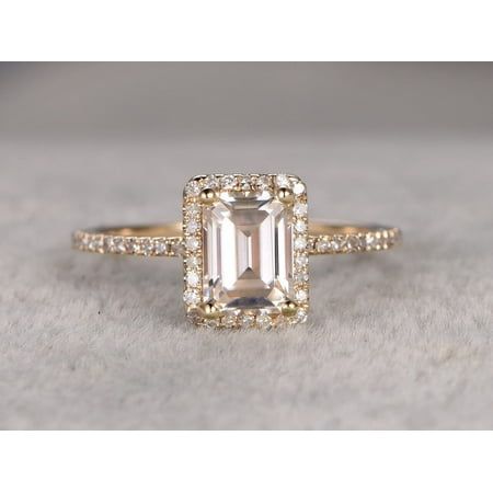 Best Emerald Cut Moissanite is made of 1.25 Ct Halo Moissanite & Moissanite Diamond Wedding Ring in 925 Silver with Rose Gold Plating. The crafted in superb semi-eternity style ring has .25 carat of real natural Moissanite Diamonds. The center stone is of 1.25 carats of real Moissanite. Lets feature this ring in the engagement ring trends of 2019. Size: 5.0.  Color: Yellow.  Gender: female.  Age Group: adult. Diamond Ring With Emerald, Ring With Emerald, Emerald Cut Engagement, Trending Engagement Rings, Emerald Cut Moissanite, Ring Trends, Moissanite Diamond Rings, Emerald Engagement Ring Cut, Gold Halo