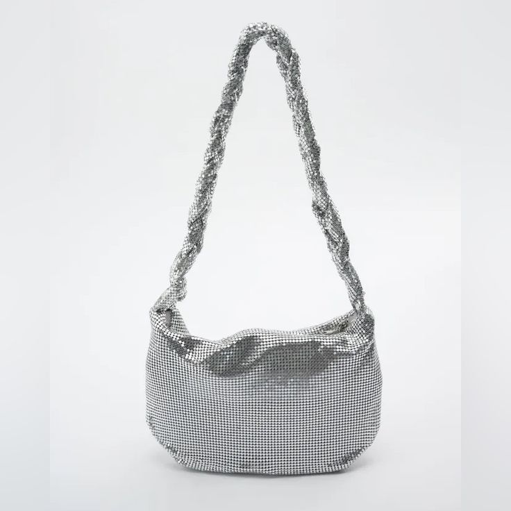 Shoulder Bag With Shiny Metallic Mesh Exterior. Lined Interior. Braided Shoulder Strap. Zip Closure. Height X Length X Width: 7.9 X 10.4 X 1.2 Inches (20 26.5 X 3 Cm) Zara Crossbody Party Bag, Zara Crossbody Bag For Party, Chic Zara Evening Bag For Party, Chic Silver Zara Shoulder Bag, Elegant Zara Shoulder Bag For Party, Silver Zara Shoulder Bag For Evening, Zara Silver Shoulder Bag For Evening, Zara Silver Evening Shoulder Bag, Chic Zara Shoulder Bag For Party