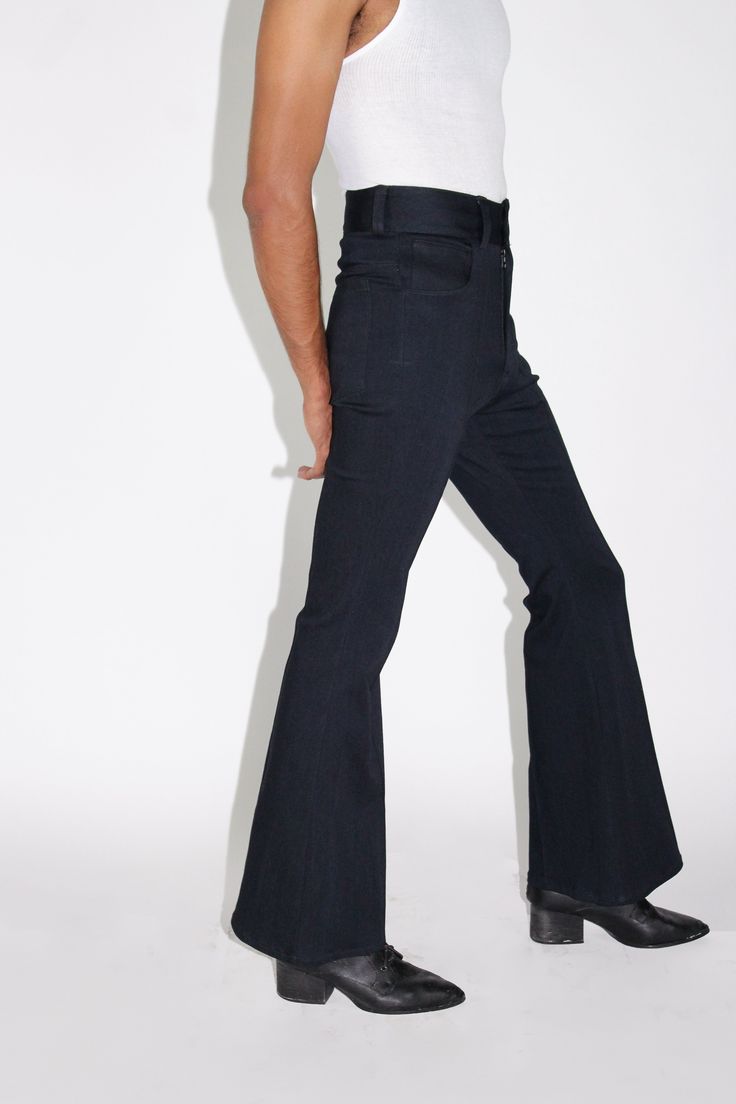 The Black Denim Flare Pant Flare High Rise Zip Fly 82% Cotton 16% Lyocell 2% Lycra Male Flared Pants, Classic Black Flare Jeans With Pockets, Modern Black Flare Jeans With Five Pockets, Classic Black Mid-rise Flare Jeans, Classic Black Flare Jeans, Modern High Rise Black Jeans, Modern Black Jeans With Belt Loops, Black Flare Jeans With Five Pockets For Work, Modern Black Jeans For Workwear