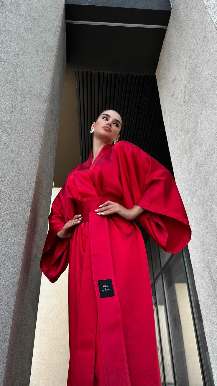 Introducing the vibrant red kimono dress, a stunning blend of elegance and comfort designed to make every woman feel extraordinary. This exquisite long kimono robe is crafted from luxurious ice satin, offering a silky smooth touch that drapes beautifully to the floor, embodying the essence of an elegant dress. Its versatile design makes it an ideal gift for your wife or daughter, ensuring they feel cherished and stylish. ◌ SIZE: - One size xs-l  - Robe length - 55" (140 cm) - Robe width - 47.2" Elegant Silk Robe With Kimono Sleeves, Elegant Maxi Kimono For Wedding, Elegant Kimono As A Gift, Elegant Kimono With Kimono Sleeves As A Gift, Elegant Kimono With Kimono Sleeves For Gift, Summer Elegant Maxi Kimono, Elegant Summer Maxi Kimono, Summer Elegant Maxi Length Kimono, Elegant Satin Finish Kimono For Party