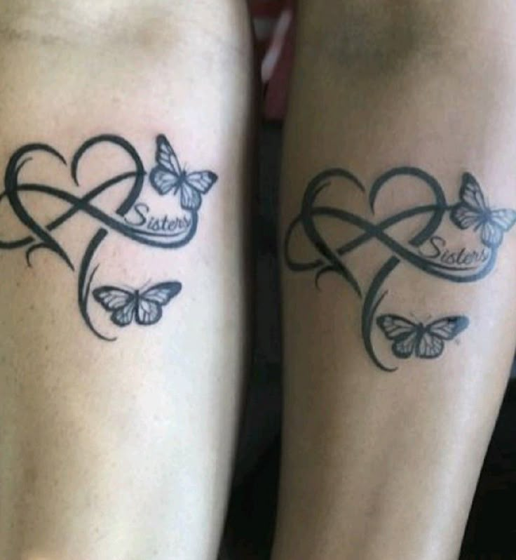 two people with tattoos on their legs that have butterflies and hearts in the shape of heart