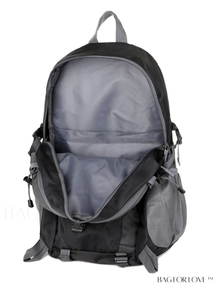 the back view of a backpack on a white background, it is grey and black