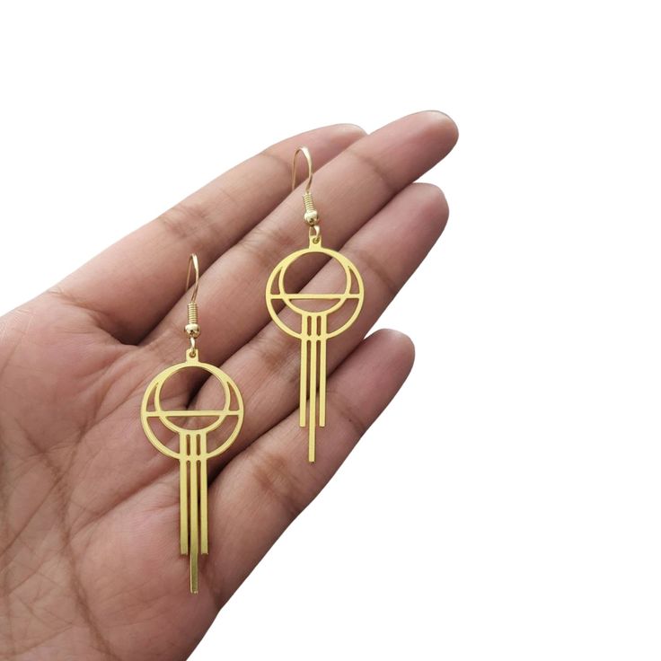 **All orders come with tracked shipping** PLUS **Free shipping on orders over $35 USD for US customers** High quality brass Gatsby/Art deco style earrings with very unique geometric shape. There are 2 jewelry box options: Box A: regular jewelry cardboard box with a textured diamond pattern on the outside (comes in white, black or red) Box B: Velvet earring and necklace box (comes in green, red and grey) You can also add a mini gift bag as shown in the pics: comes with green, red or grey satin ri Retro Brass Jewelry With Matching Earrings, Retro Gold Nickel-free Jewelry, Retro Nickel-free Gold Jewelry, Retro Brass Drop Earrings, Art Deco Brass Jewelry With Matching Earrings, Retro Brass Dangle Jewelry, Art Deco Dangle Brass Earrings, Nickel-free Dangle Earrings In Art Deco Style, Nickel-free Dangle Art Deco Earrings